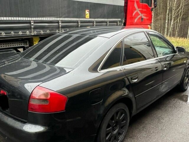 Черный Ауди А6, объемом двигателя 2.5 л и пробегом 319 тыс. км за 1850 $, фото 3 на Automoto.ua