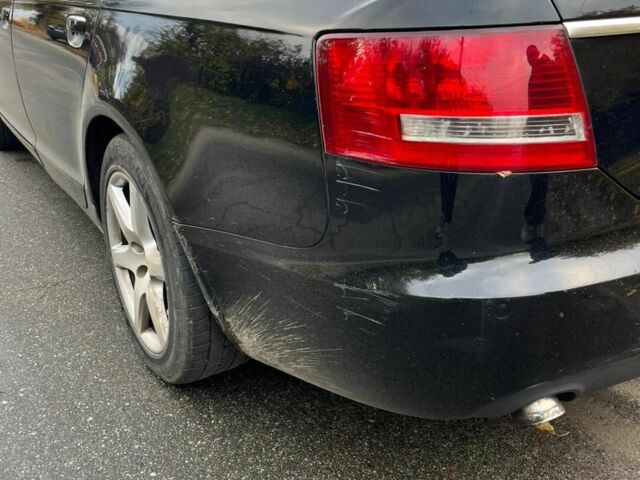 Черный Ауди А6, объемом двигателя 2 л и пробегом 434 тыс. км за 2800 $, фото 1 на Automoto.ua