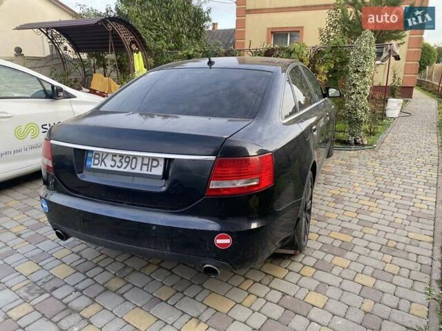 Черный Ауди А6, объемом двигателя 3 л и пробегом 216 тыс. км за 5800 $, фото 1 на Automoto.ua