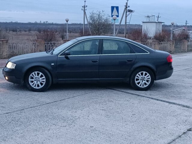 Черный Ауди А6, объемом двигателя 2.5 л и пробегом 250 тыс. км за 2850 $, фото 4 на Automoto.ua