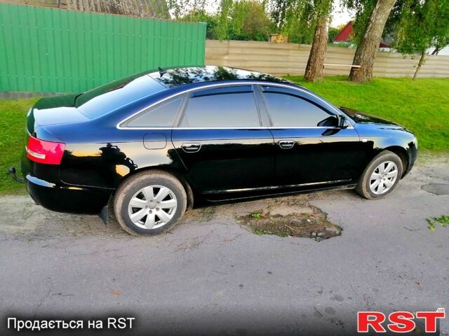 Черный Ауди А6, объемом двигателя 2 л и пробегом 300 тыс. км за 8600 $, фото 3 на Automoto.ua