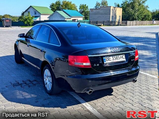 Черный Ауди А6, объемом двигателя 2.4 л и пробегом 220 тыс. км за 5950 $, фото 1 на Automoto.ua