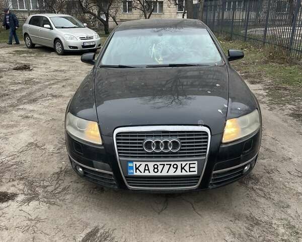 Черный Ауди А6, объемом двигателя 2 л и пробегом 215 тыс. км за 6000 $, фото 1 на Automoto.ua