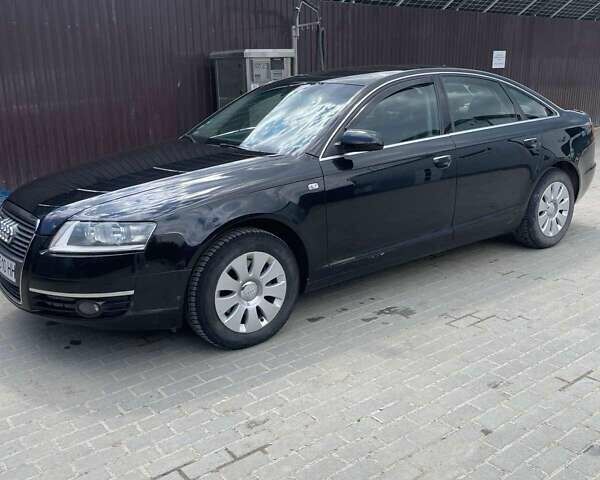 Черный Ауди А6, объемом двигателя 2 л и пробегом 352 тыс. км за 7067 $, фото 2 на Automoto.ua