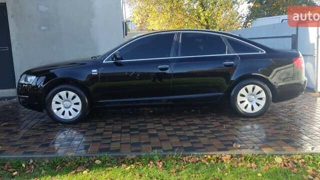 Чорний Ауді А6, об'ємом двигуна 1.98 л та пробігом 503 тис. км за 7500 $, фото 1 на Automoto.ua