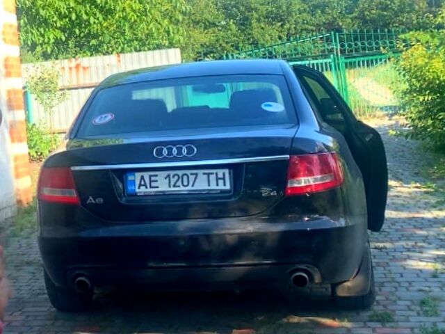 Черный Ауди А6, объемом двигателя 2.4 л и пробегом 400 тыс. км за 7000 $, фото 1 на Automoto.ua