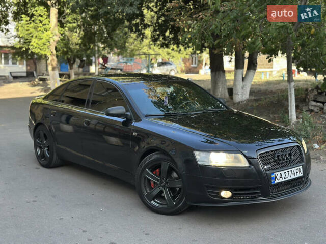 Черный Ауди А6, объемом двигателя 1.98 л и пробегом 299 тыс. км за 7000 $, фото 1 на Automoto.ua