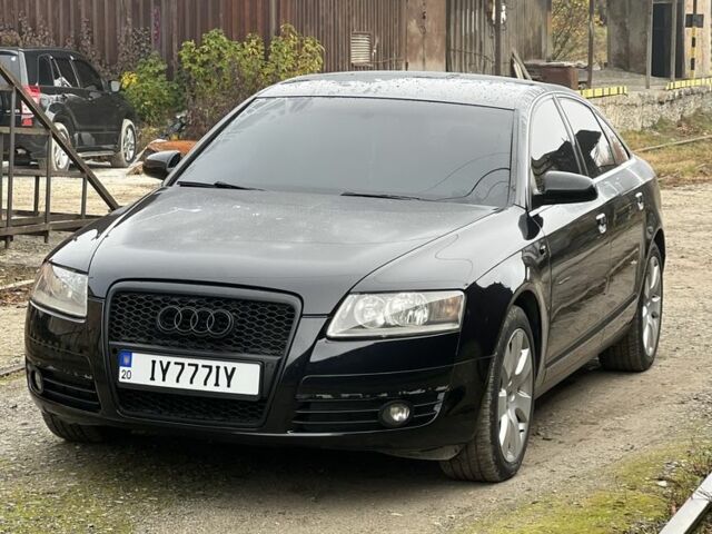 Черный Ауди А6, объемом двигателя 2 л и пробегом 253 тыс. км за 6999 $, фото 1 на Automoto.ua
