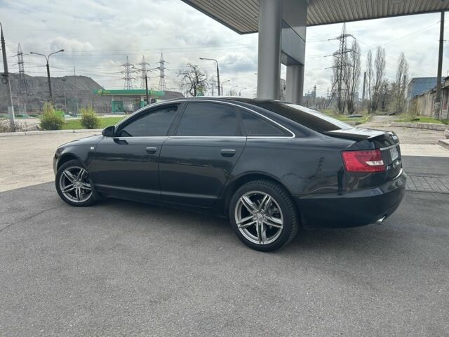 Черный Ауди А6, объемом двигателя 2.4 л и пробегом 305 тыс. км за 7800 $, фото 1 на Automoto.ua