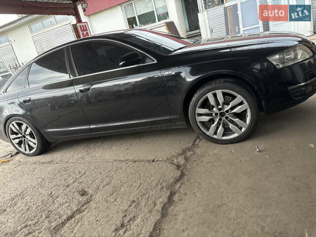 Черный Ауди А6, объемом двигателя 4.2 л и пробегом 320 тыс. км за 10500 $, фото 1 на Automoto.ua