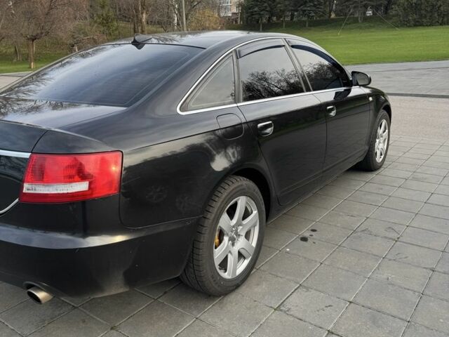 Черный Ауди А6, объемом двигателя 2.4 л и пробегом 261 тыс. км за 9500 $, фото 2 на Automoto.ua