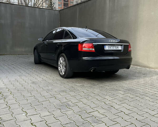 Черный Ауди А6, объемом двигателя 1.98 л и пробегом 253 тыс. км за 7200 $, фото 4 на Automoto.ua