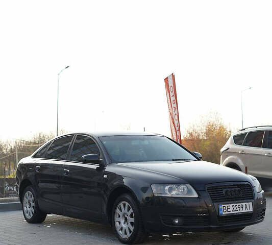 Черный Ауди А6, объемом двигателя 2.4 л и пробегом 318 тыс. км за 8500 $, фото 1 на Automoto.ua