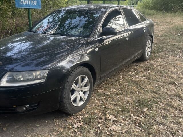 Черный Ауди А6, объемом двигателя 2 л и пробегом 263 тыс. км за 3500 $, фото 1 на Automoto.ua