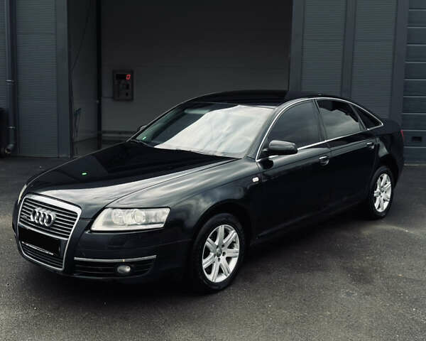 Черный Ауди А6, объемом двигателя 3.2 л и пробегом 385 тыс. км за 6050 $, фото 1 на Automoto.ua