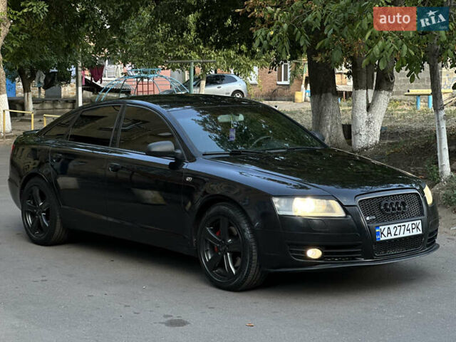 Черный Ауди А6, объемом двигателя 1.98 л и пробегом 299 тыс. км за 7000 $, фото 24 на Automoto.ua