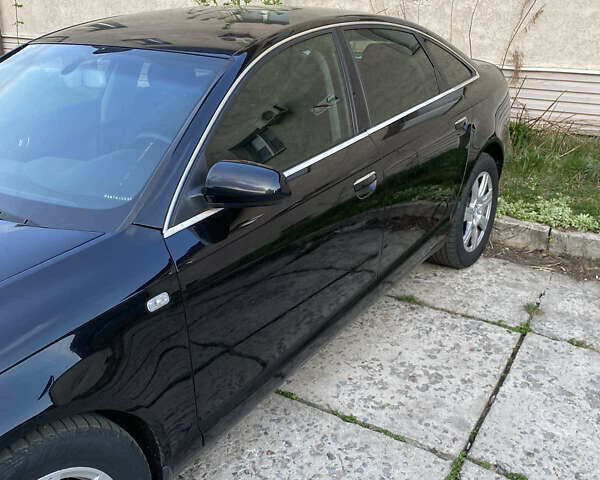 Чорний Ауді А6, об'ємом двигуна 2.4 л та пробігом 272 тис. км за 7500 $, фото 4 на Automoto.ua