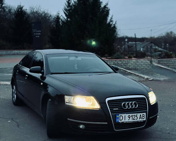 Черный Ауди А6, объемом двигателя 3.12 л и пробегом 385 тыс. км за 5450 $, фото 1 на Automoto.ua