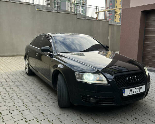 Черный Ауди А6, объемом двигателя 1.98 л и пробегом 253 тыс. км за 7200 $, фото 1 на Automoto.ua