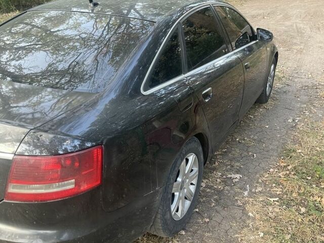 Черный Ауди А6, объемом двигателя 2 л и пробегом 264 тыс. км за 2700 $, фото 1 на Automoto.ua