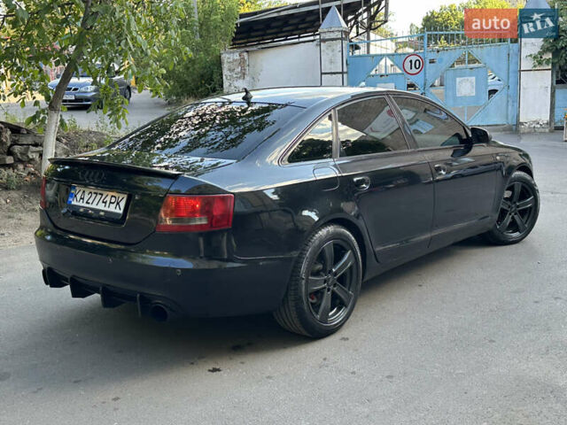 Черный Ауди А6, объемом двигателя 1.98 л и пробегом 299 тыс. км за 7000 $, фото 11 на Automoto.ua