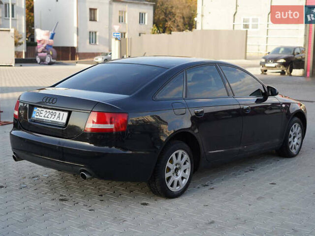 Черный Ауди А6, объемом двигателя 2.4 л и пробегом 318 тыс. км за 8500 $, фото 6 на Automoto.ua