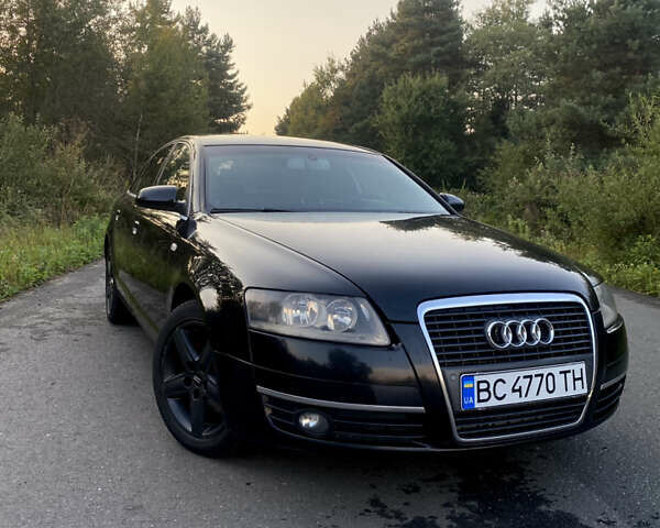 Чорний Ауді А6, об'ємом двигуна 1.96 л та пробігом 404 тис. км за 6950 $, фото 1 на Automoto.ua