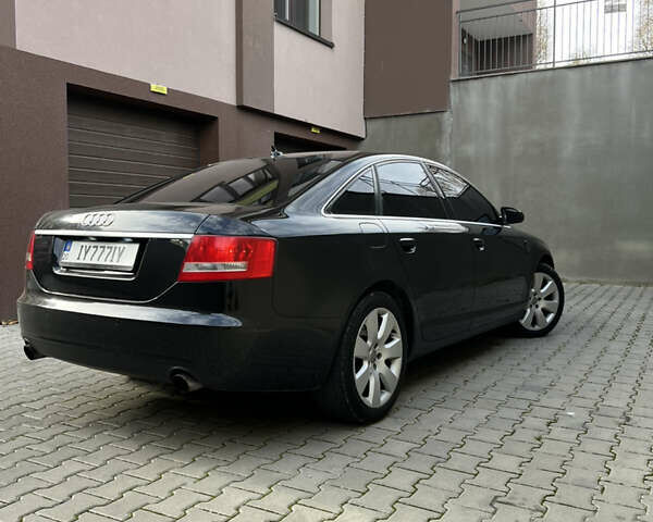 Черный Ауди А6, объемом двигателя 1.98 л и пробегом 253 тыс. км за 7200 $, фото 8 на Automoto.ua