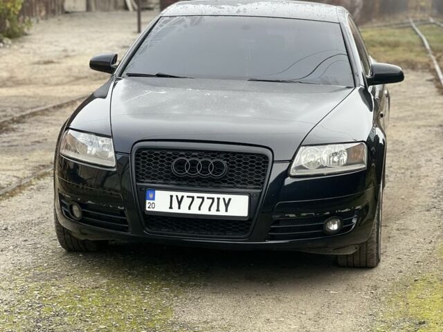 Черный Ауди А6, объемом двигателя 2 л и пробегом 253 тыс. км за 6999 $, фото 2 на Automoto.ua