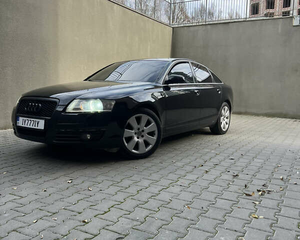 Черный Ауди А6, объемом двигателя 1.98 л и пробегом 253 тыс. км за 7200 $, фото 2 на Automoto.ua