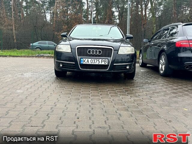 Чорний Ауді А6, об'ємом двигуна 2.4 л та пробігом 305 тис. км за 7000 $, фото 1 на Automoto.ua