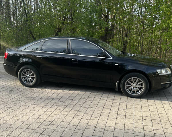 Черный Ауди А6, объемом двигателя 2.4 л и пробегом 275 тыс. км за 6000 $, фото 3 на Automoto.ua