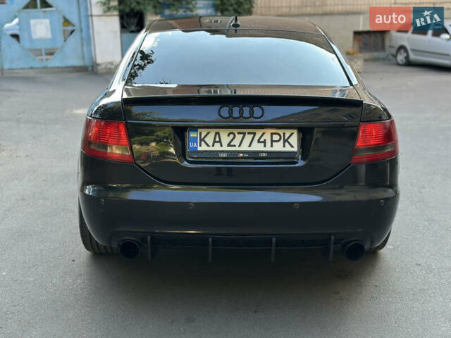 Черный Ауди А6, объемом двигателя 1.98 л и пробегом 299 тыс. км за 7000 $, фото 4 на Automoto.ua