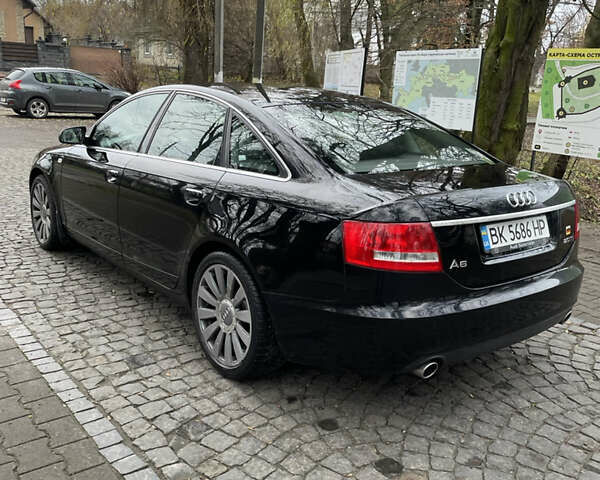 Черный Ауди А6, объемом двигателя 2 л и пробегом 248 тыс. км за 7600 $, фото 26 на Automoto.ua