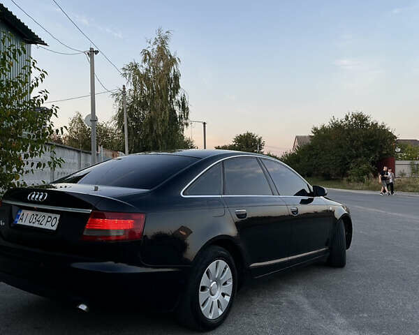 Чорний Ауді А6, об'ємом двигуна 1.97 л та пробігом 434 тис. км за 8300 $, фото 1 на Automoto.ua