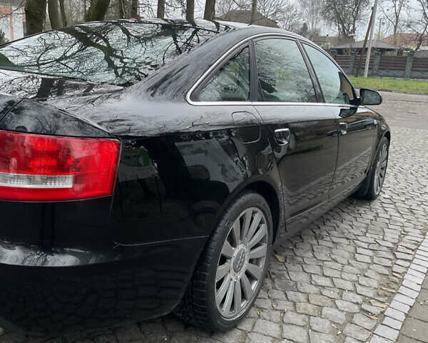 Черный Ауди А6, объемом двигателя 2 л и пробегом 248 тыс. км за 7600 $, фото 20 на Automoto.ua