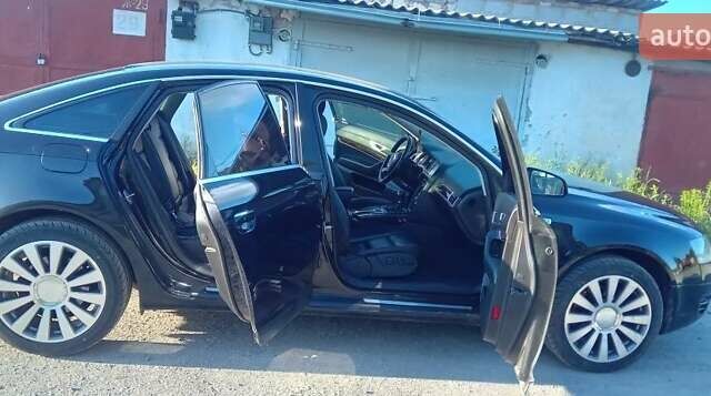 Черный Ауди А6, объемом двигателя 2.4 л и пробегом 260 тыс. км за 7600 $, фото 6 на Automoto.ua