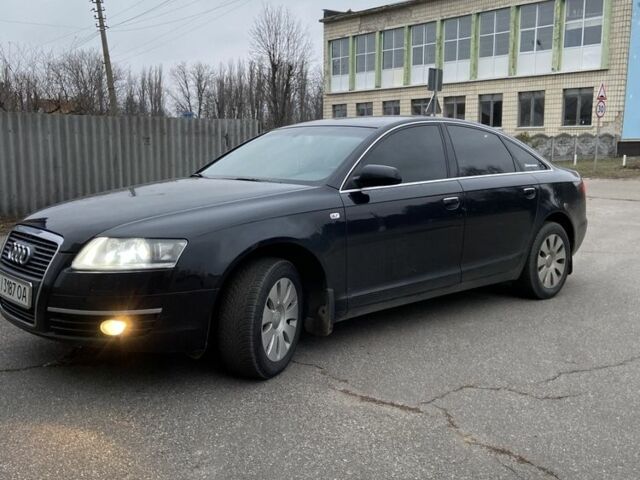 Черный Ауди А6, объемом двигателя 2.4 л и пробегом 197 тыс. км за 7600 $, фото 1 на Automoto.ua