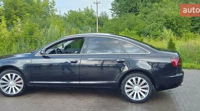 Черный Ауди А6, объемом двигателя 2.4 л и пробегом 260 тыс. км за 7600 $, фото 2 на Automoto.ua