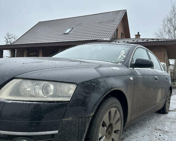 Черный Ауди А6, объемом двигателя 1.98 л и пробегом 256 тыс. км за 5500 $, фото 1 на Automoto.ua