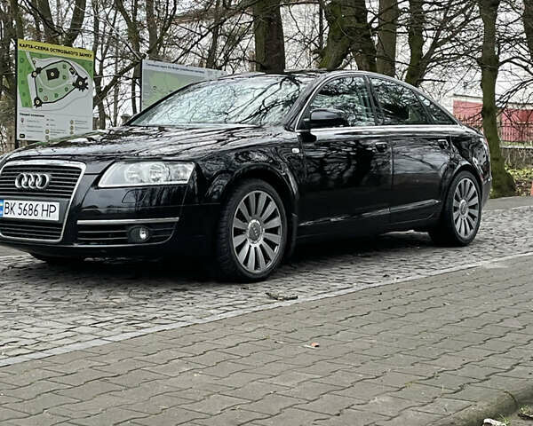 Черный Ауди А6, объемом двигателя 2 л и пробегом 248 тыс. км за 7600 $, фото 4 на Automoto.ua
