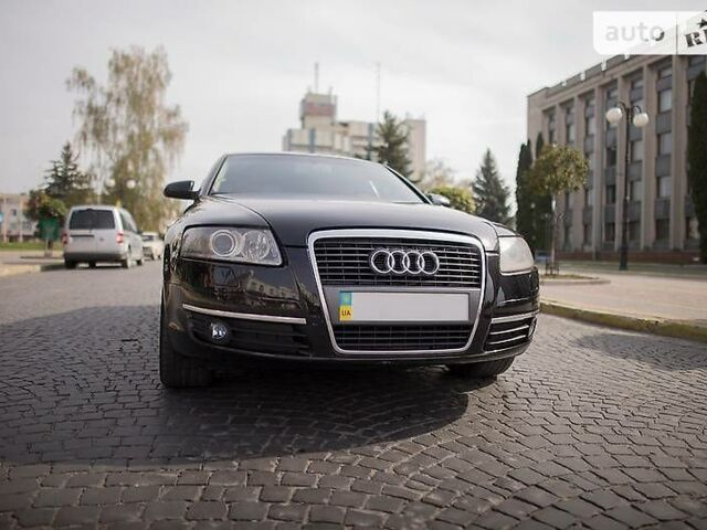 Черный Ауди А6, объемом двигателя 2 л и пробегом 280 тыс. км за 9700 $, фото 1 на Automoto.ua
