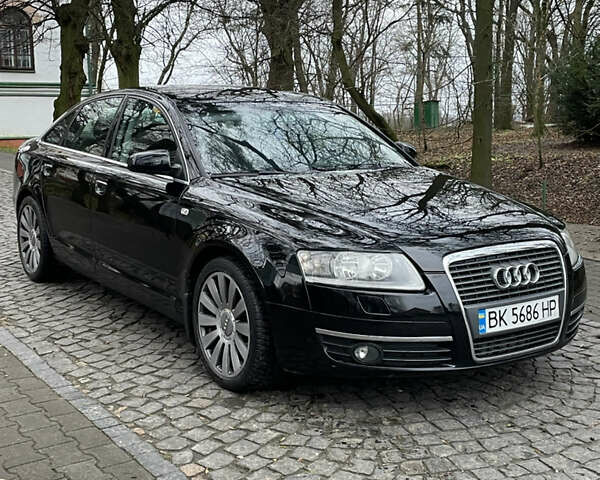 Черный Ауди А6, объемом двигателя 2 л и пробегом 248 тыс. км за 7600 $, фото 3 на Automoto.ua