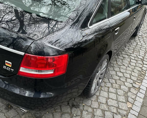 Черный Ауди А6, объемом двигателя 2 л и пробегом 248 тыс. км за 7600 $, фото 21 на Automoto.ua