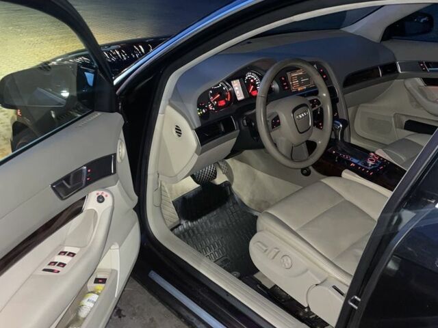 Черный Ауди А6, объемом двигателя 2.4 л и пробегом 275 тыс. км за 7000 $, фото 5 на Automoto.ua