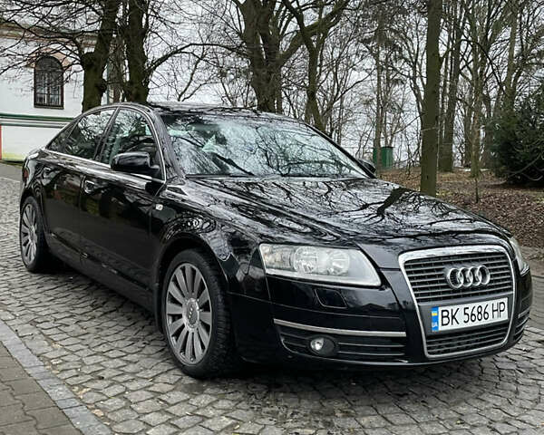 Черный Ауди А6, объемом двигателя 2 л и пробегом 248 тыс. км за 7600 $, фото 2 на Automoto.ua