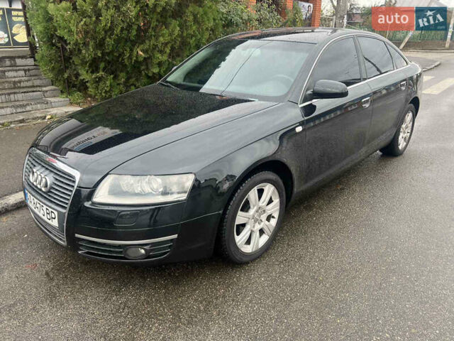 Черный Ауди А6, объемом двигателя 2 л и пробегом 266 тыс. км за 8200 $, фото 1 на Automoto.ua
