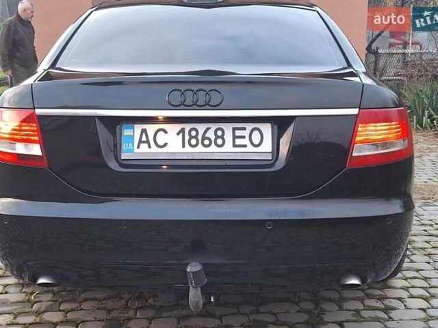 Черный Ауди А6, объемом двигателя 2 л и пробегом 340 тыс. км за 8500 $, фото 1 на Automoto.ua