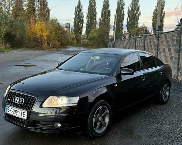 Черный Ауди А6, объемом двигателя 2 л и пробегом 247 тыс. км за 9200 $, фото 1 на Automoto.ua