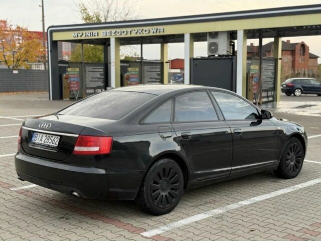 Черный Ауди А6, объемом двигателя 2 л и пробегом 230 тыс. км за 2400 $, фото 2 на Automoto.ua